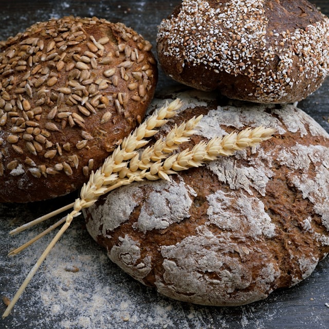 Freshly baked artisan sourdough loaves dusted with flour